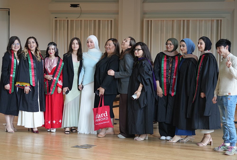 Picture for blog post. Displaced students pose at their Bard graduation.